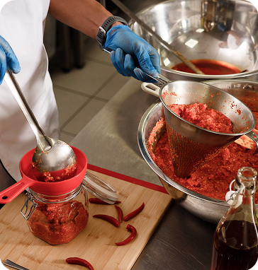 Corporate setting showcasing Tabchilliâ€™s professional team and fermentation products.